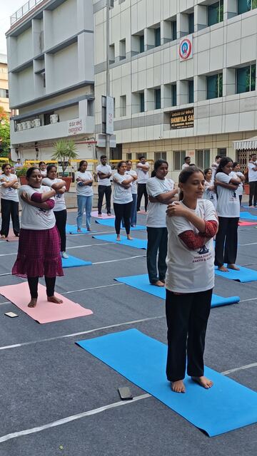 Participants doing a crossed-arm stretch pose